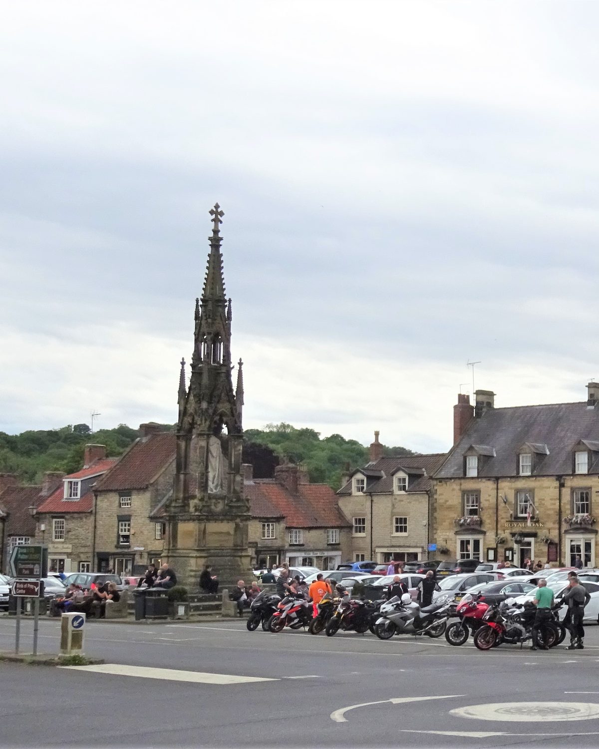 Helmsley Market Place: the Feversham Monument and the limestone shops around the square where The Helmsley Bookshop stands